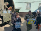 Росгвардейцы помогают эвакуированным из зоны боевых действий в ЛНР